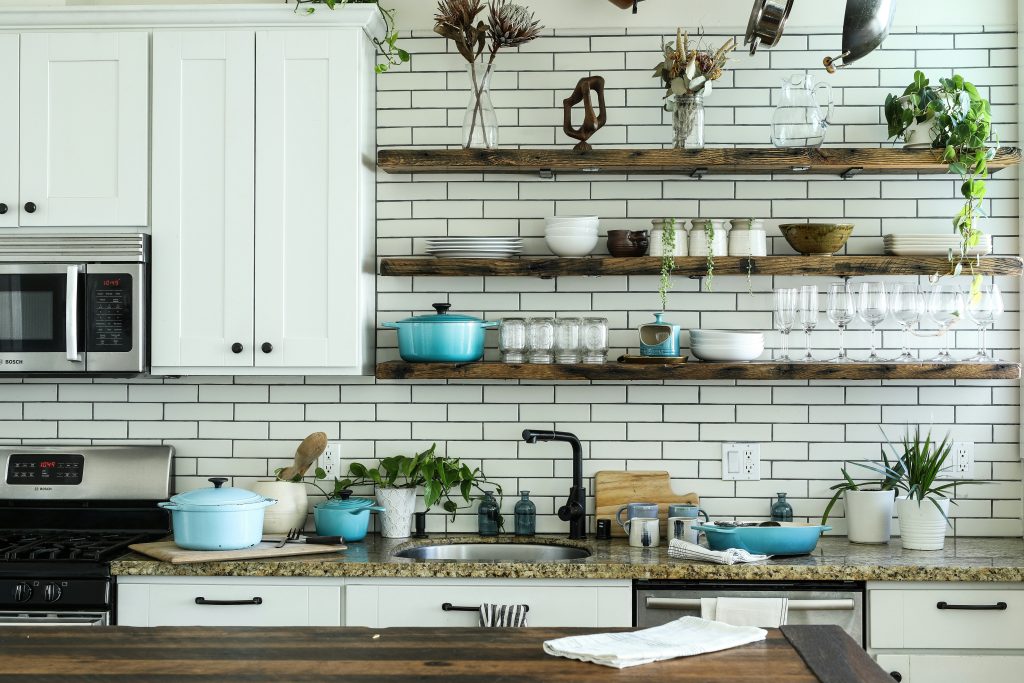 Side of the kitchen with many items.